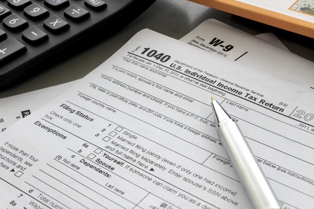 calculator, 1040 tax form, pen, irs, taxes, strategic tax resolution